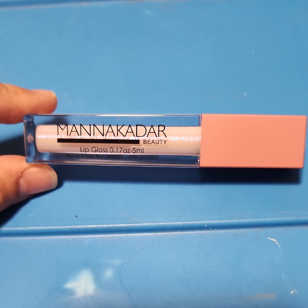 5/$25 Manna Kadar Beauty Lip Gloss with Pink Cap